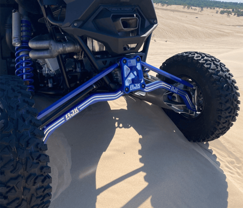 Polaris Pro R / Turbo R High Clearance Radius Rods by AJK Offroad in Blue Left Angle in Sand Dunes