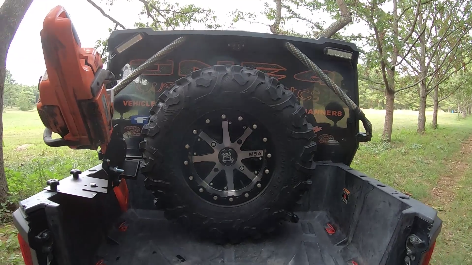 murray_chainsaw_and_tire__70038.png
